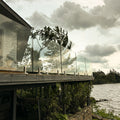 Full perimeter glass fence on waterside deck