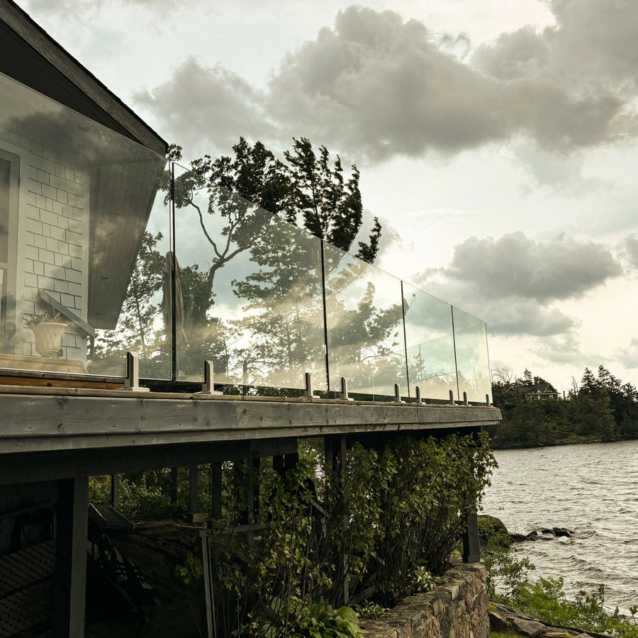 Full perimeter glass fence on waterside deck